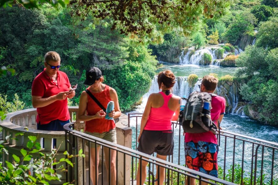 Split/Trogir: Krka National Park Day Trip & Boat to Skradin - Entering Krka National Park and finding the waterfalls