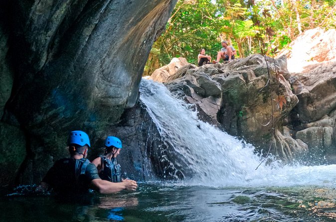 Two-in-One Day Trip: El Yunque and Bio Bay Tour with Transport - Swimming, slides, jumps, and river fun