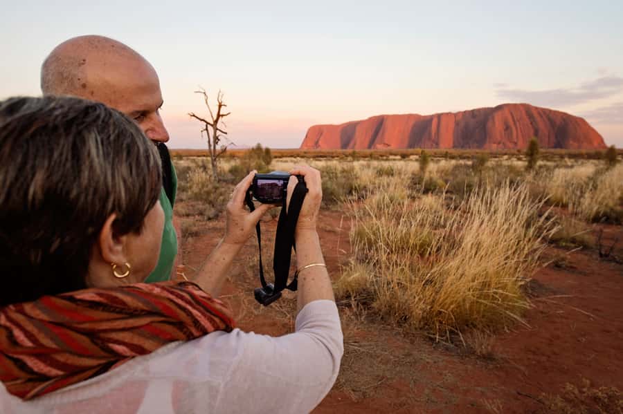 Yulara: Uluru Sunrise and Kata Tjuta Day Trip by Bus - Watching Uluru wake up at Talinguru Nyakunytjaku
